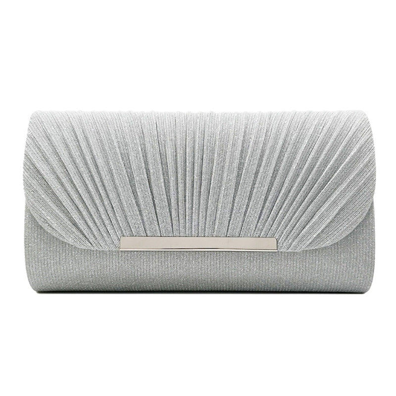 Pochette rose femme – Motifs élégants, bords métalliques, idéale pour les soirées
